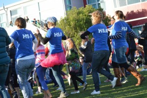 Members of the HSA (Home and School Association) dance together at this year's community night